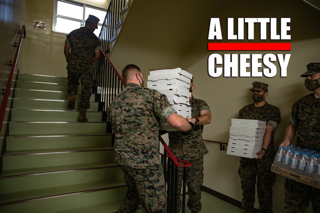 U.S. Marines with 3rd Marine Logistics Group deliver pizza on behalf of Marine Corps Community Services to Marines in Restriction of Movement status on Camp Kinser, Okinawa, Japan, April 23, 2020. Marines in ROM status are restricted to their rooms for 14 days after arrival from any CDC THN level two or three locations, to self-monitor for development of fever or symptoms of COVID-19. (U.S. Marine Corps photo by Pfc. Courtney A. Robertson)