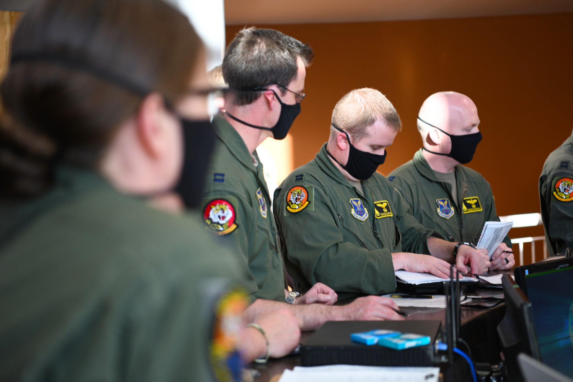 Aviators from the 37th Bomb Squadron receive a final mission briefing before launching B-1B Lancers from Ellsworth Air Force Base, S.D., April 28, 2020. The crew flew two B-1s from the continental United States and conducted operations over the South China Sea as part of a joint U.S. Indo-Pacific Command and U.S. Strategic Command Bomber Task Force mission. (U.S. Air Force photo by Senior Airman Nicolas Erwin)