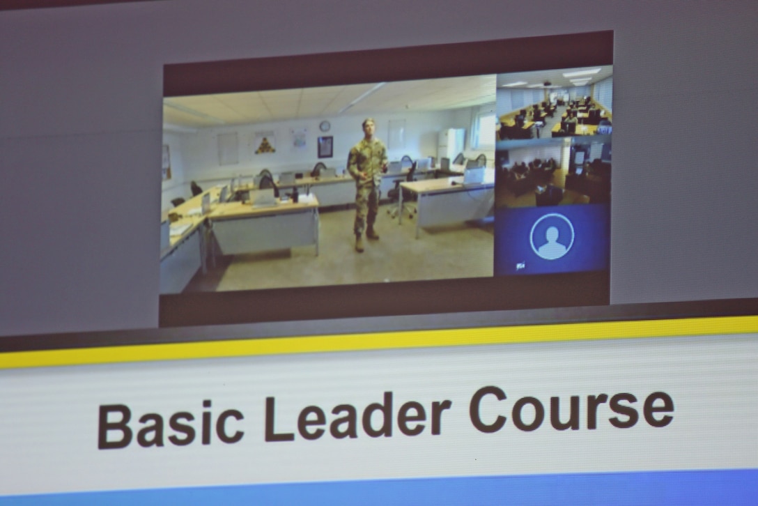 U.S. Army Staff Sgt. Austin Fischer, an instructor with the 7th Army Noncommissioned Officer Academy in Grafenwoehr, Germany, teaches a block of instruction over video teleconference to students of a virtual Basic Leader Course located in Kaiserslautern, Germany, April 21, 2020. The first-ever four-week virtual BLC course for junior enlisted Soldiers is being led by the 7th Army NCOA and has both Reserve and active duty students collaborating online from 20 classrooms in four countries across Europe.