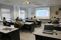 U.S. Army Reserve and active duty Soldiers interact with their instructor over video teleconference during a virtual Basic Leader Course locally hosted by the 7th Mission Support Command in Kaiserslautern, Germany, April 21, 2020. Two 7th MSC noncommissioned officers are providing leadership as assistant instructors for one of 20 classrooms in four countries across Europe during the first-ever four-week virtual BLC course being led by the 7th Army NCO Academy out of Grafenwoehr, Germany.