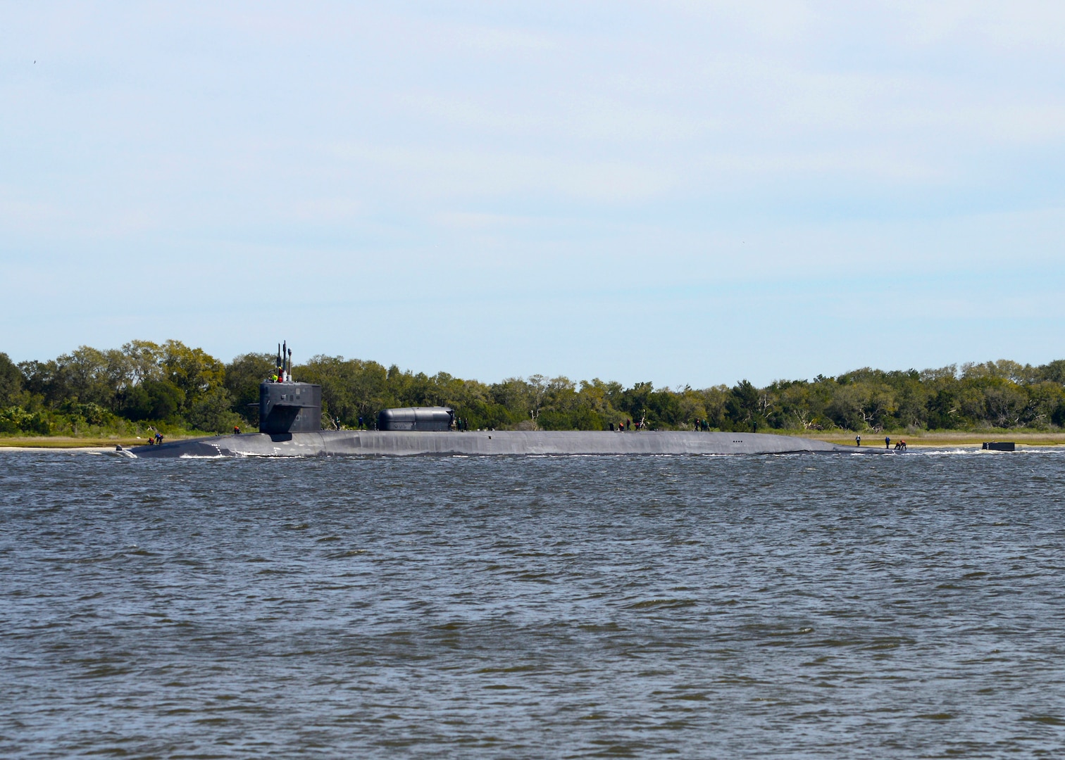 The Ohio-class guided-missile submarine USS Georgia (SSGN 729)(Gold) returns to its homeport at Naval Submarine Base Kings Bay, Ga. Ohio-class guided-missile submarines are capable of carrying up to 154 tomahawk land-attack cruise missiles. The base is home to all East Coast Ohio-Class submarines.