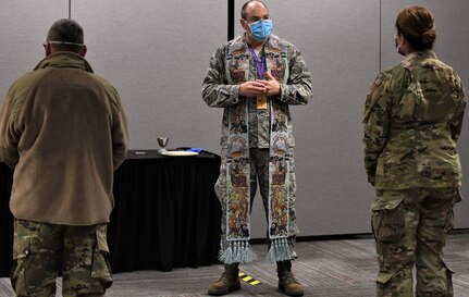 New York Air National Guard Chaplain (Lt. Col.) Jacob Marvel conducts Easter Mass for service members at the Javits Convention Center in New York City while following social distancing guidelines April 12, 2020. New York Army and Air National Guard chaplains, like their counterparts in the South African National Defence Force, are focused on providing religious opportunities and counseling to troops involved in efforts to contain the COVID-19 pandemic.