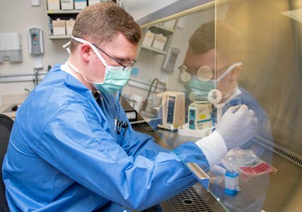 Army Spc. David Pyke, medical laboratory technician, loads a patient sample for rapid COVID-19 polymerase chain reaction, or PCR, testing at Brooke Army Medical Center, Joint Base San Antonio-Fort Sam Houston, April 9. PCR is the central technology for COVID-19 testing.