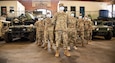 1st Lt. Scott Dobson, officer in charge of Task Force Saber, stands with a few of the Pennsylvania National Guard mortuary affairs and fatality search and recovery team at the 1st City Troop National Guard Armory in Center City Philadelphia on April 25, 2020. These teams are trained to return our fallen warriors with the upmost honor, respect and dignity.