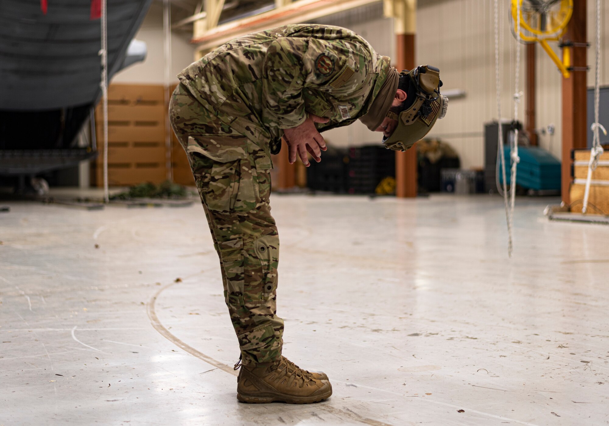 A photo of an Airman practicing static-line jump procedures