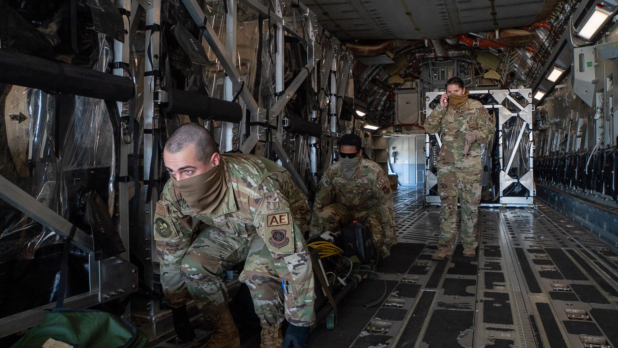 Airmen from the 521st Air Mobility Operations Wing support a Transport Isolation System operation at Ramstein Air Base, Germany, recently. Wing Airmen are postured to rapidly respond and support a broad range of missions transiting through Ramstein AB on any given day. (Courtesy photo)