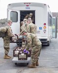 NORWICH, NY – New York Army National Guard Soldiers assigned to Delta Company, 2nd Battalion, 108th Infantry Regiment, distribute food in rural Chenango County April 23, 2020.
