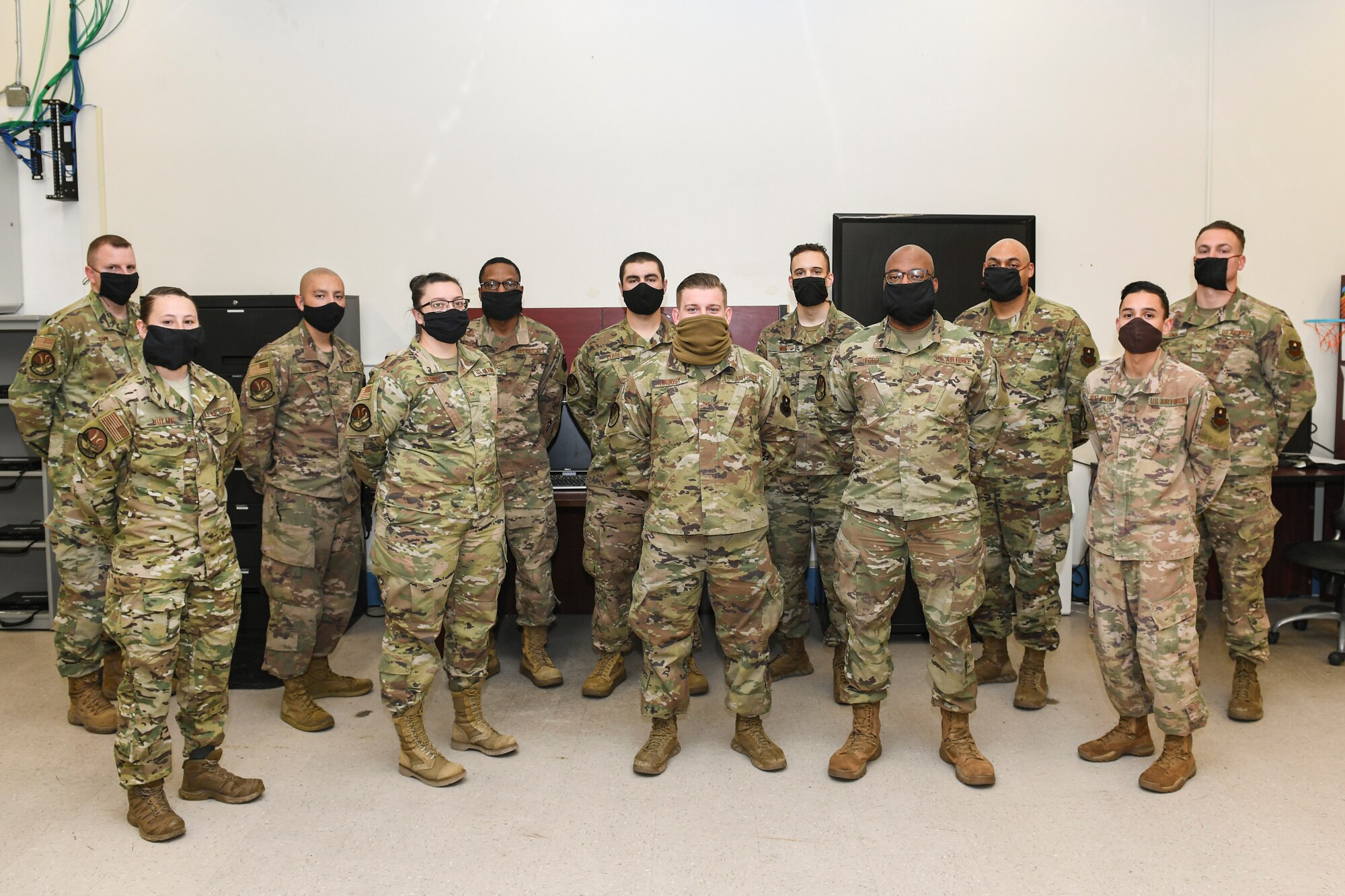 Group photo of Airman wearing face coverings