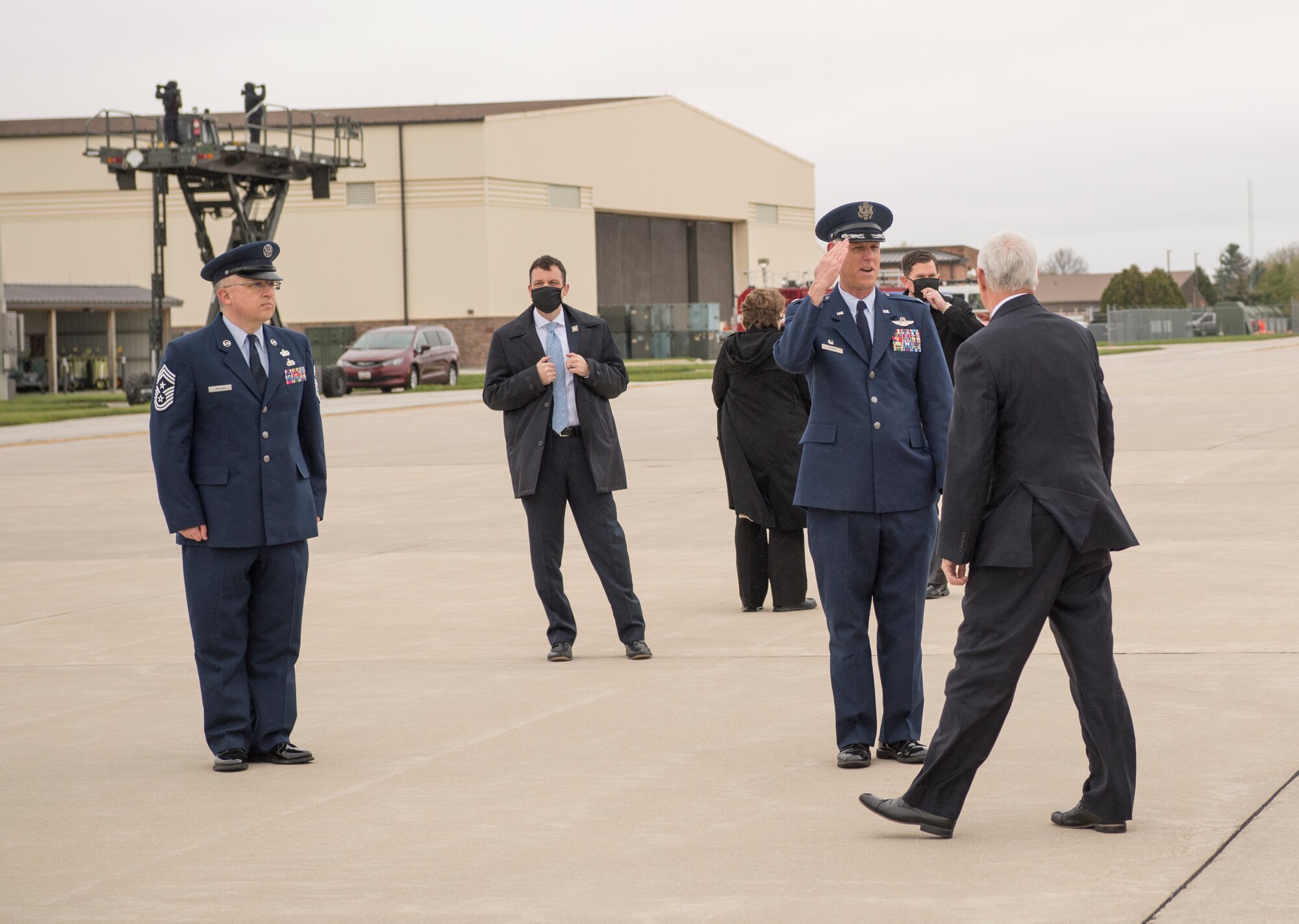 Col. Larry Shaw, 434th Air Refueling Wing Commander salutes Vice President Mike Pence upon his arrival at Grissom Air Reserve Base, Indiana April 30, 2020. Pence came to Indiana to meet with local business leaders who are building ventilators during the COVID-19 outbreak. (U.S Air Force photo/Ben Mota)