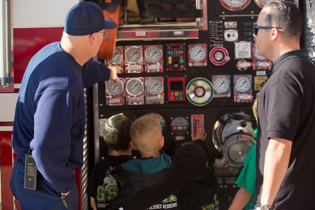 Students from the local community take a tour of aircraft rescue and firefighting during a field trip, Marine Corps Air Station Yuma, Feb. 6, 2020.