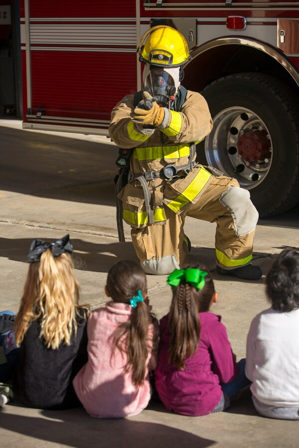 Students from the local community take a tour of aircraft rescue and firefighting during a field trip, Marine Corps Air Station Yuma, Feb. 6, 2020.