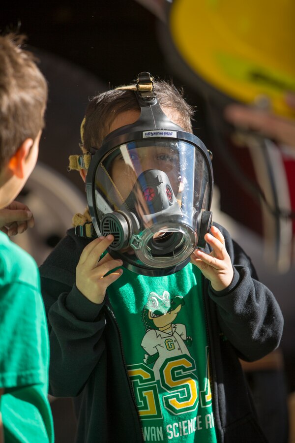 Students from the local community take a tour of aircraft rescue and firefighting during a field trip, Marine Corps Air Station Yuma, Feb. 6, 2020.