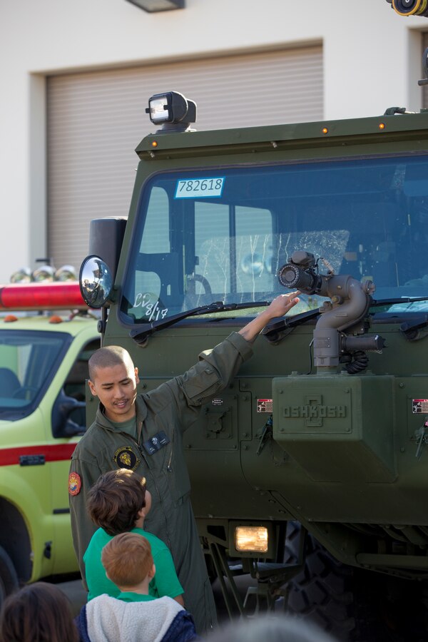 Students from the local community take a tour of aircraft rescue and firefighting during a field trip, Marine Corps Air Station Yuma, Feb. 6, 2020.