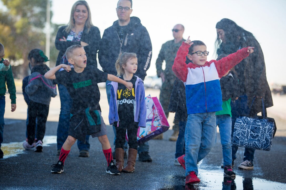 Students from the local community take a tour of aircraft rescue and firefighting during a field trip, Marine Corps Air Station Yuma, Feb. 6, 2020.