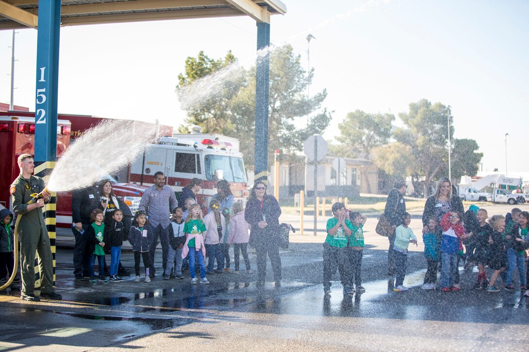 Students from the local community take a tour of aircraft rescue and firefighting during a field trip, Marine Corps Air Station Yuma, Feb. 6, 2020.