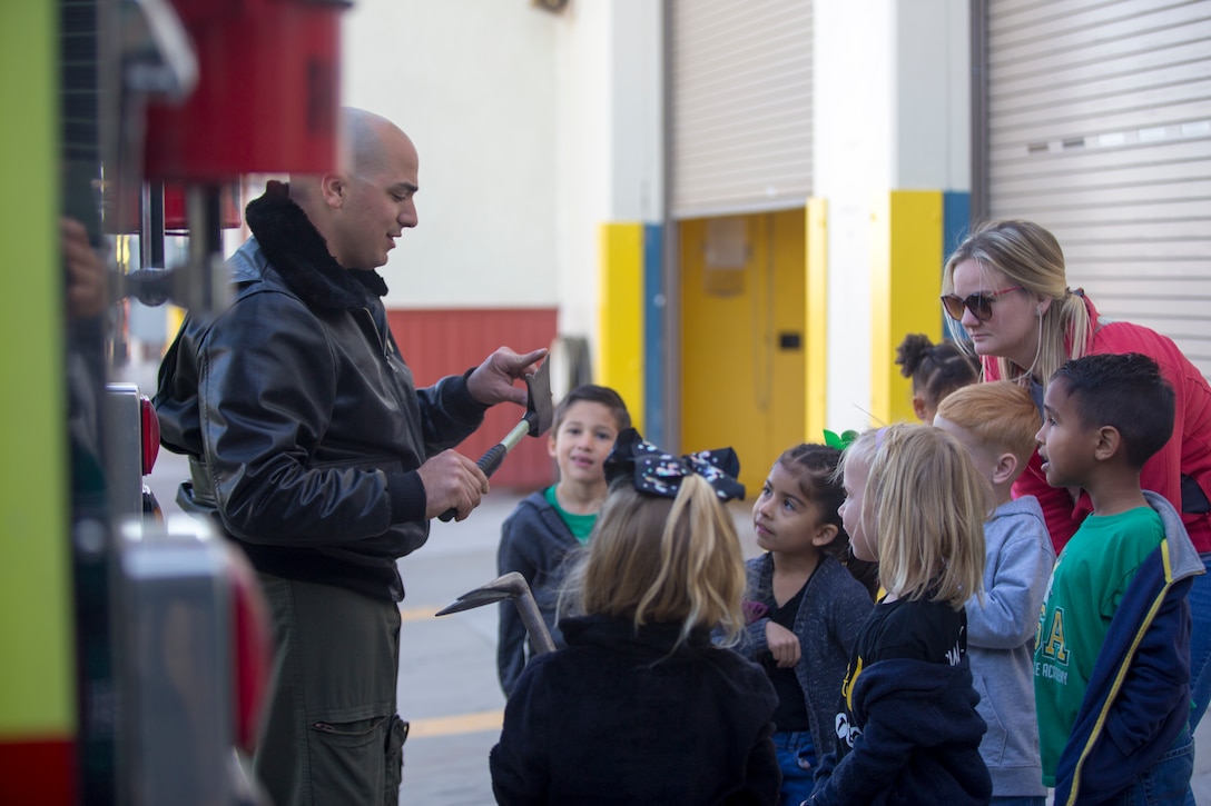 Students from the local community take a tour of aircraft rescue and firefighting during a field trip, Marine Corps Air Station Yuma, Feb. 6, 2020.