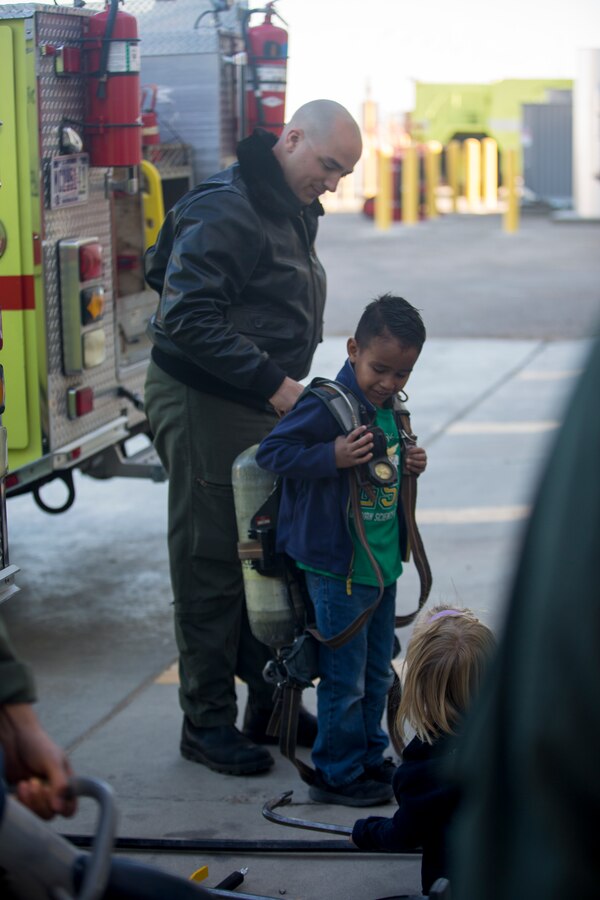 Students from the local community take a tour of aircraft rescue and firefighting during a field trip, Marine Corps Air Station Yuma, Feb. 6, 2020.