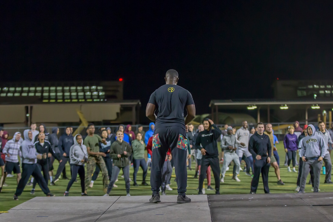 U.S. Marines and Sailors with Headquarters and Headquarters Squadron (H&HS), Marine Corps Air Station (MCAS) Yuma, participate in a squadron physical training event on MCAS Yuma, Feb. 7, 2020. H&HS conducts a monthly squadron pt event to create comradery amongst the H&HS work sections and to raise espirit de corps. (U.S. Marine Corps photo by Lance Cpl John Hall)