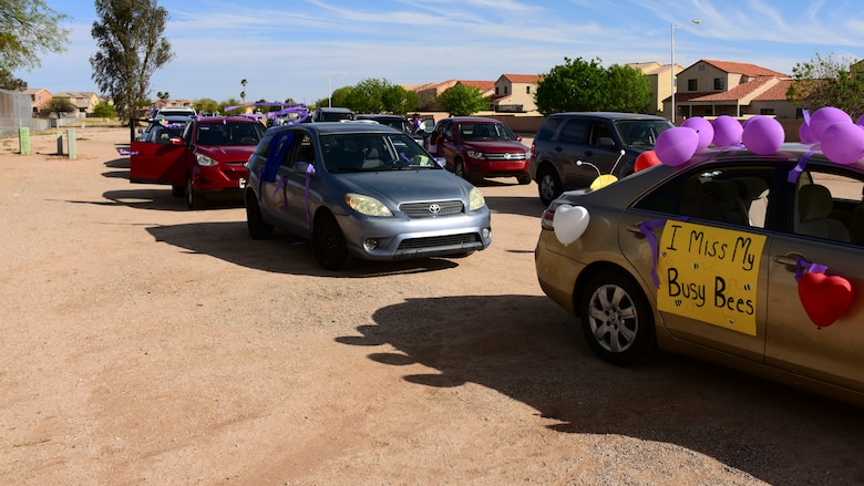 A photo of cars riding down the road