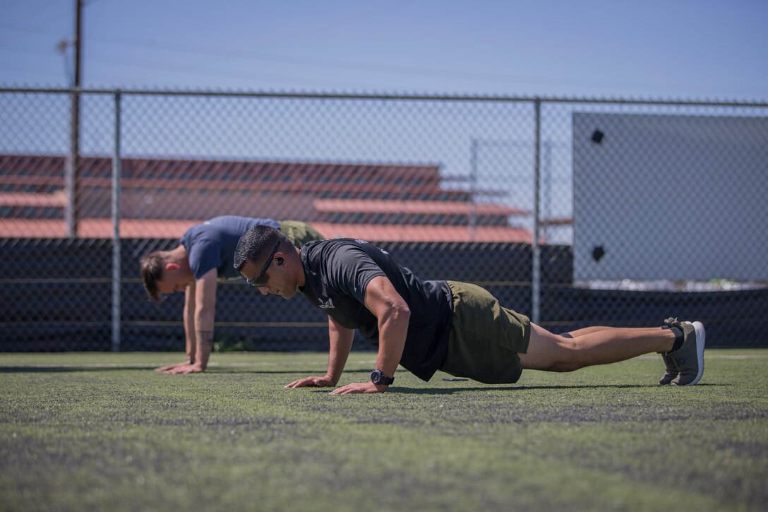 U.S. Marines with Marine Attack Squadron (VMA) 214, conduct physical training aboard Marine Corps Air Station (MCAS) Yuma, April 3, 2020.