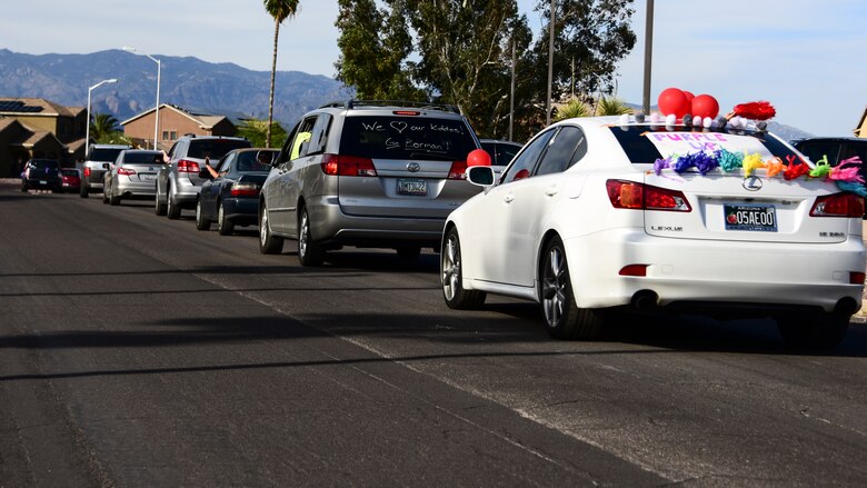 A photo of cars riding down the road