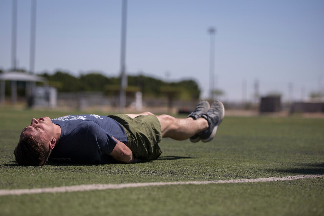 U.S. Marines with Marine Attack Squadron (VMA) 214, conduct physical training aboard Marine Corps Air Station (MCAS) Yuma, April 3, 2020.