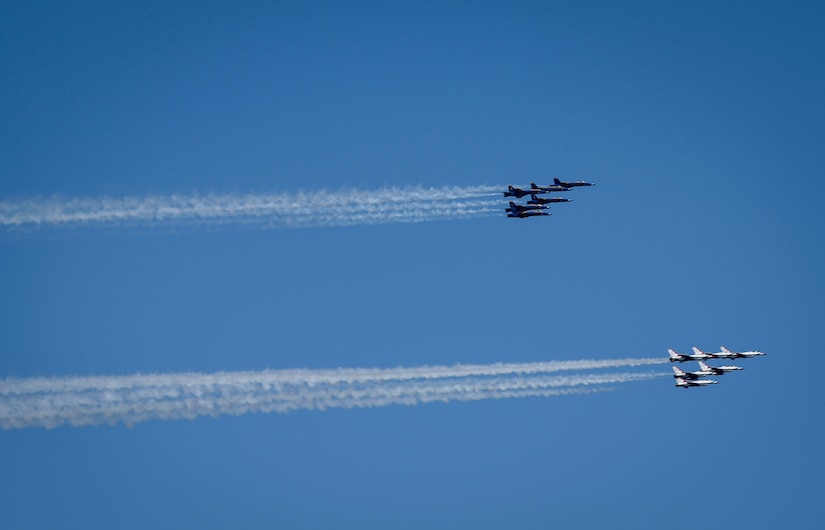 Photo of Blue Angels and Thunderbirds flying together.