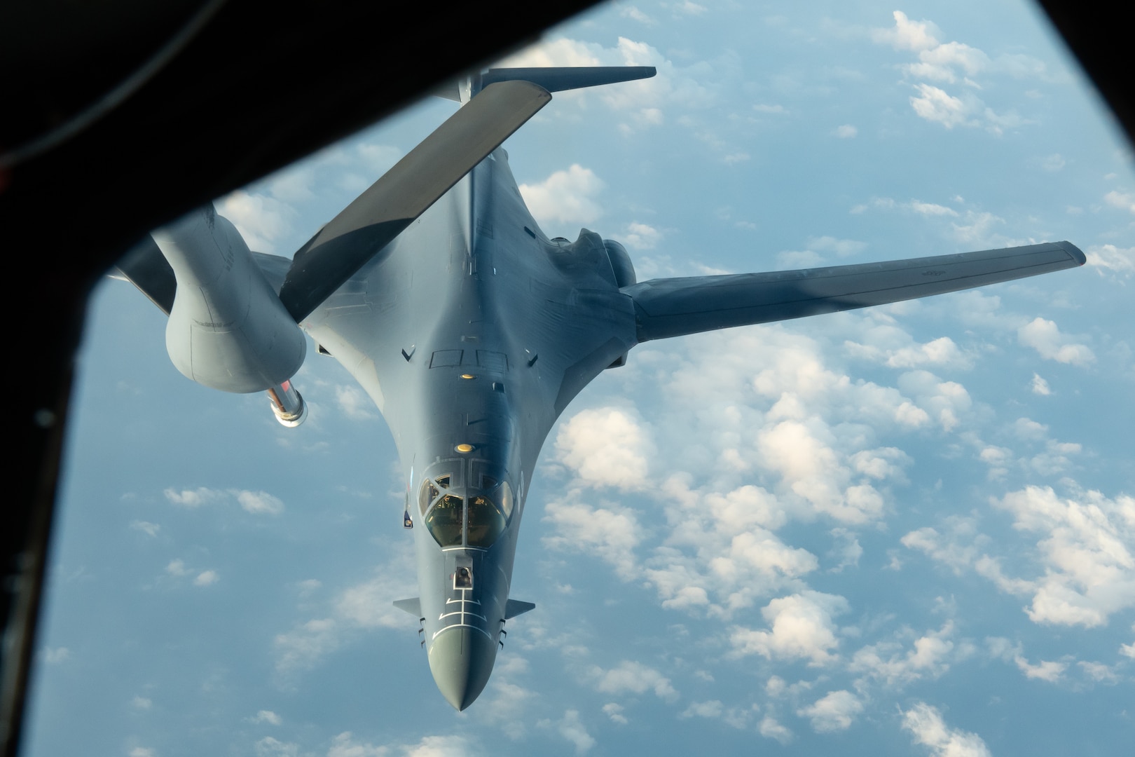 A U.S. Air Force B-1B Lancer from the 28th Bomb Wing, Ellsworth Air Force Base, S.D., approaches a KC-135 Stratotanker from the 909th Air Refueling Squadron, to refuel during a 32-hour round-trip sortie to conduct operations over the Pacific as part of a joint U.S. Indo-Pacific Command and U.S. Strategic Command (USSTRATCOM) Bomber Task Force (BTF) mission April 30, 2020. This operation demonstrates the U.S. Air Force’s dynamic force employment model in line with the National Defense Strategy’s objectives of strategic predictability with persistent bomber presence, assuring allies and partners. (U.S. Air Force photo by Senior Airman Cynthia Belío)