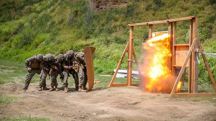 U.S. Marines with Combat Assault Company, 3rd Marine Regiment, conduct an urban demolition exercise on Marine Corps Base Hawaii, April 28, 2020. Combat Assault Company provides a wide variety of unique assault and engineer capabilities to 3rd Marine Regiment in any clime or place. (U.S. Marine Corps photo by Cpl. Eric Tso)