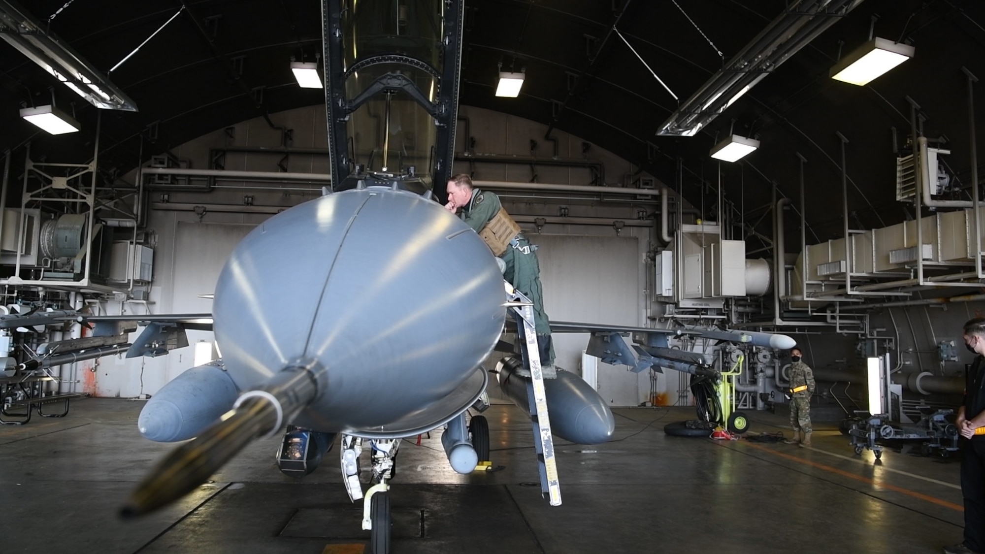 Col Kristopher Struve, 35th Fighter Wing commander, Misawa Air Base, Japan, prepares to execute an air-to-air sortie with Lt Gen Kevin B. Schneider, 5th Air Force commander, April 29, 2020. This training continues amid COVID-19 concerns and mitigation efforts.