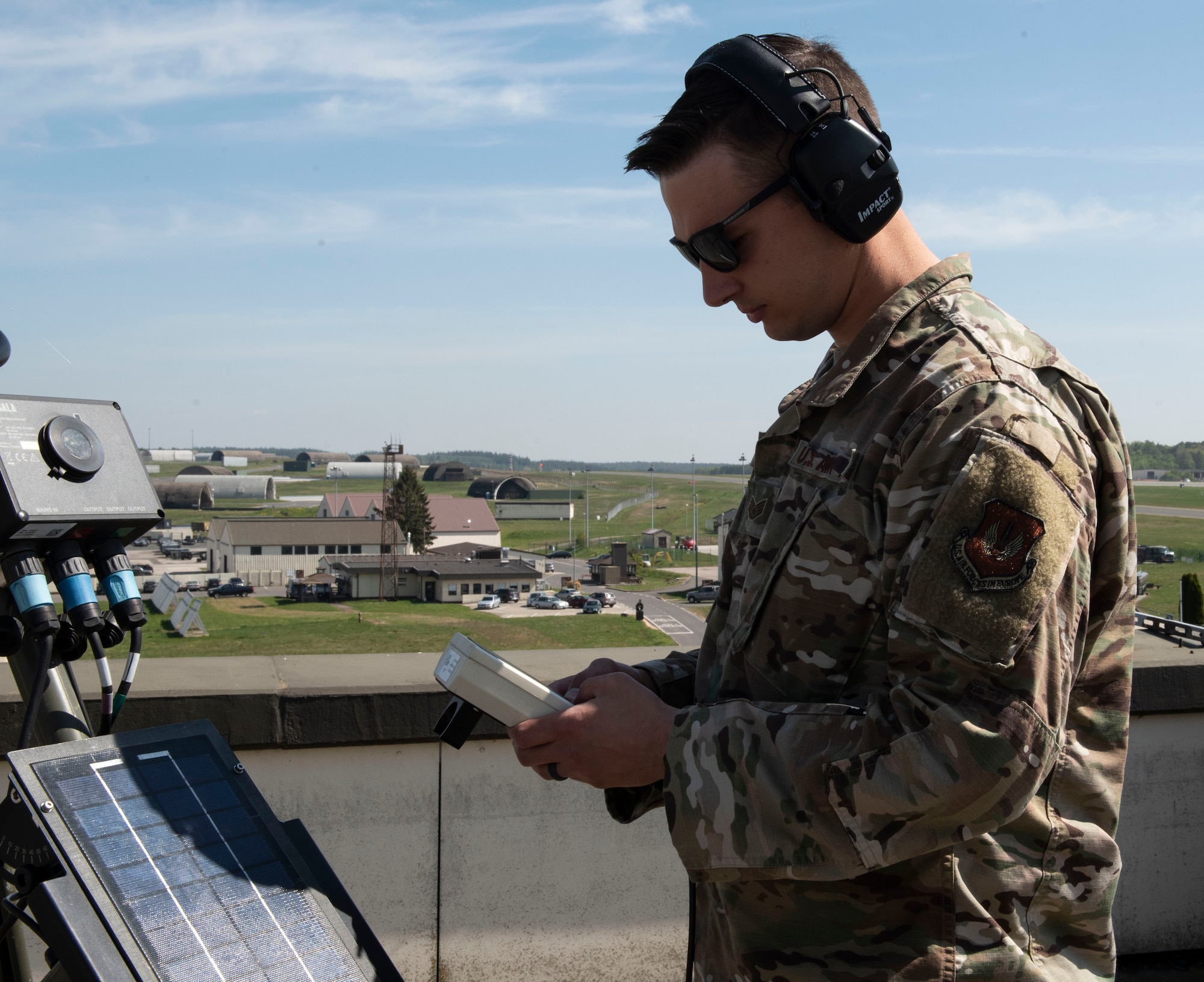 U.S. Air Force Staff Sgt. Kevin Perritt, 52nd OSS Weather Flight NCOIC of mission weather operations, uses a Tactical Meteorological Observation System (TMQ-53), at Spangdahlem Air Base, Germany, April 28, 2020. Perritt has been maintaining mission readiness during the COVID-19 pandemic by creating new products for the 480th Fighter Squadron in helping make their mission planning more seamless when prepping for weather limiting factors. (U.S. Air Force photo by Senior Airman Melody W. Howley)