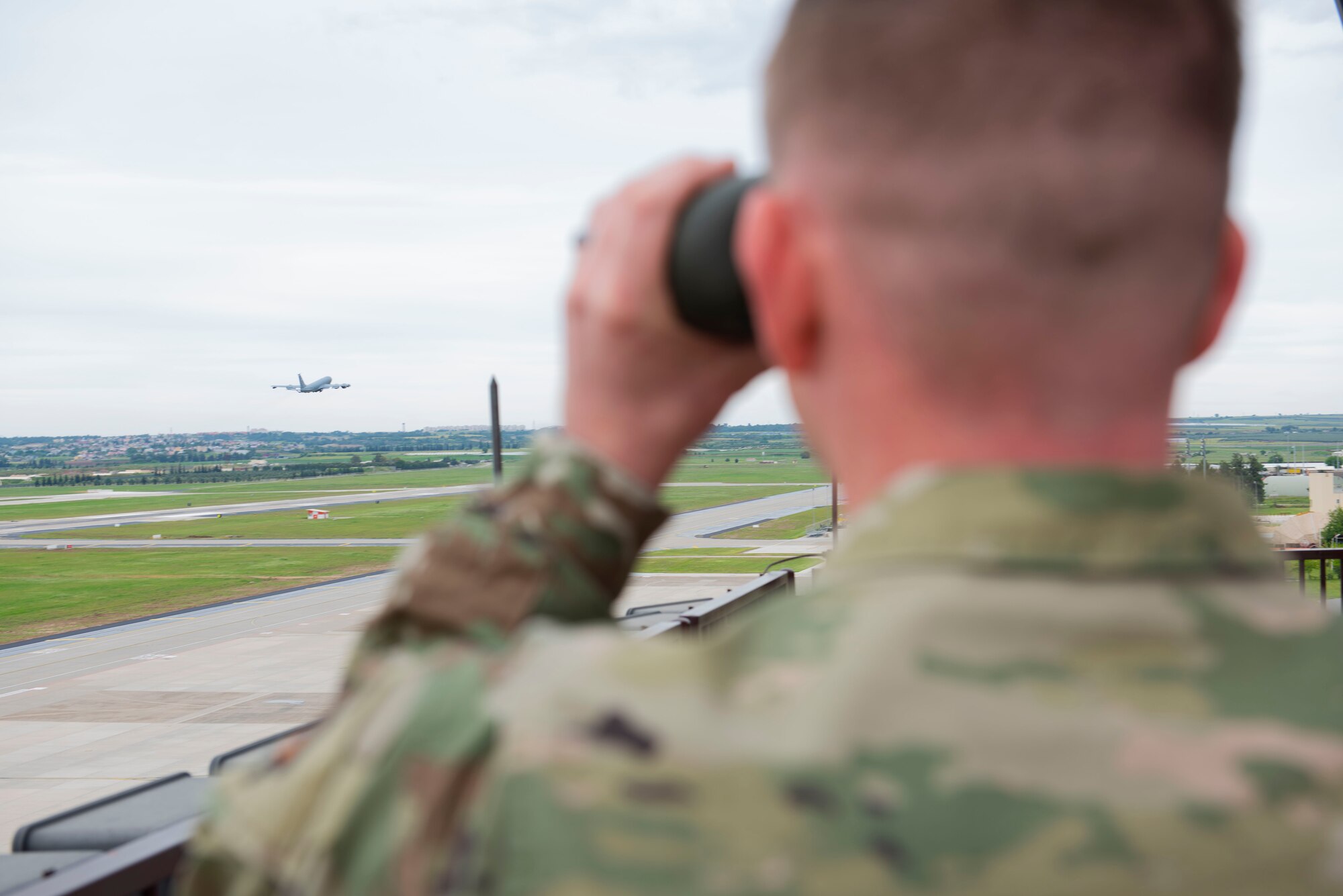 U.S. Air Force Tech. Sgt. Damian Mize, 39th Operation Support Squadron air traffic control watch supervisor, watches an aircraft take off at Incirlik Air Base, Turkey, April 24, 2020.