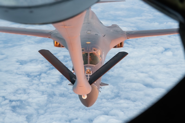 A U.S. Air Force B-1B Lancer from the 28th Bomb Wing, Ellsworth Air Force Base, S.D., refuels with a KC-135 Stratotanker from the 909th Air Refueling Squadron during a 32-hour round-trip sortie to conduct operations over thePacific as part of a joint U.S. Indo-Pacific Command and U.S. Strategic Command (USSTRATCOM) Bomber Task Force (BTF) mission April 30, 2020. This operation demonstrates the U.S. Air Force’s dynamic force employment model in line with the National Defense Strategy’s objectives of strategic predictability with persistent bomber presence, assuring allies and partners. (U.S. Air Force photo by Senior Airman Cynthia Belío)