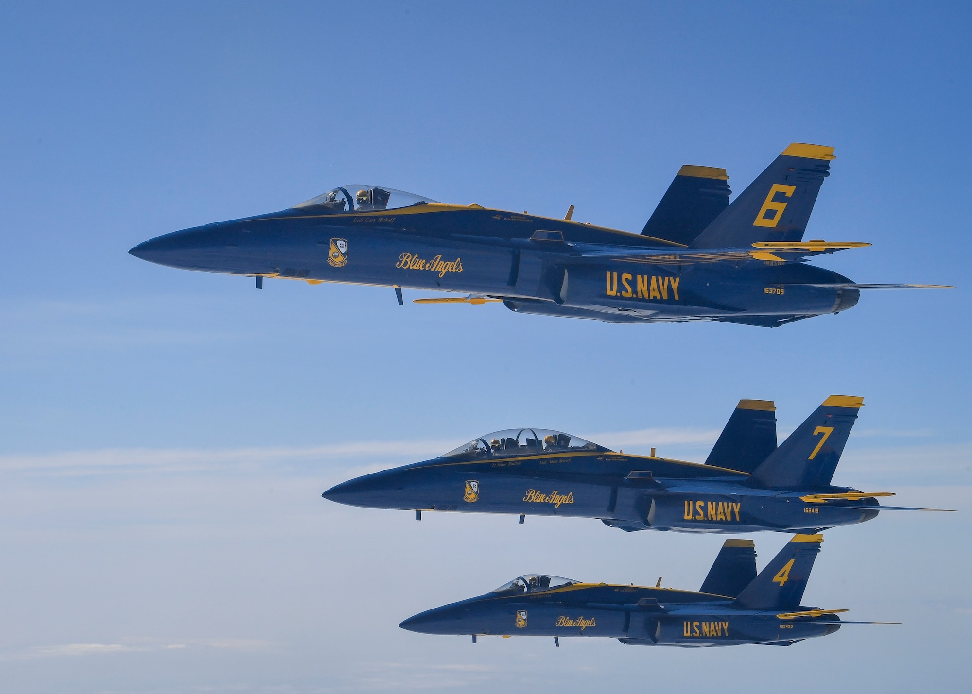 An F/A-18 Hornet assigned to the U.S. Navy Flight Blue Angels approaches a KC-10 Extender assigned to the 305th Air Mobility Squadron from Joint Base McGuire-Dix-Lakehurst, N.J., April 28, 2020. The Blue Angels conducted a joint flyover with the U.S. Air Force Thunderbirds as part of America Strong, an effort to honor healthcare workers, first responders and other essential personnel who are working on the front lines to combat COVID-19. (U.S. Air Force photo by Staff Sgt. Jake Carter)
