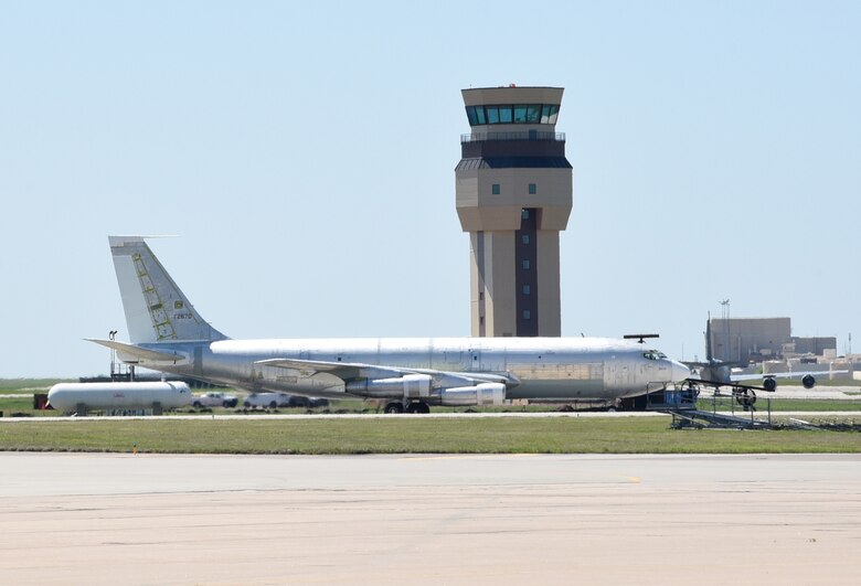 An Open Skies OC-135B Observation Aircraft rolls across the Tinker Airfield and in front of the new air traffic control tower by the 10th Flight Test Squadron. One of only two fully operational aircraft of its kind, the OC-135 is one of many unique kinds of aircraft that the 72nd Operations Support Squadron gets to support at Tinker.