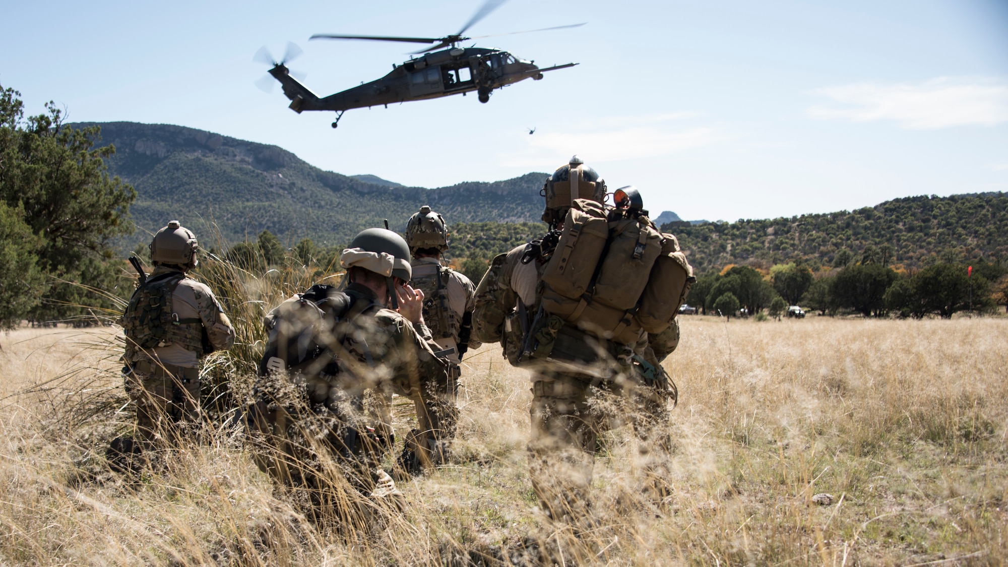 A photo of pararescueman executing a personnel recovery mission