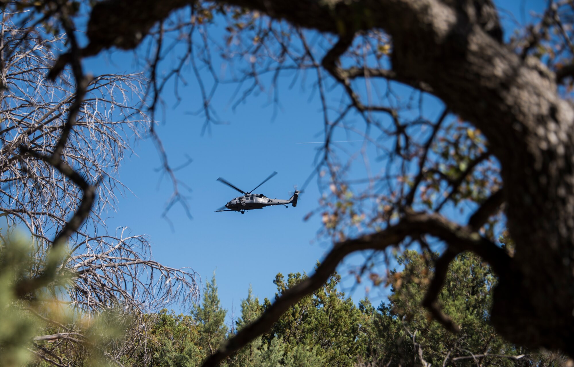 A photo of pararescueman executing a personnel recovery mission