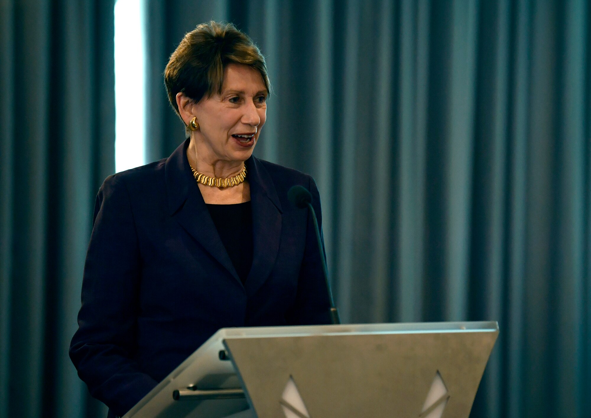 Secretary of the Air Force Barbara M. Barrett speaks during a ceremony honoring Air Force Chief of Staff David L. Goldfein at Joint Base Anacostia-Bolling, Washington, D.C., July 31, 2020. The ceremony unveiled a new etching for the memorial's Wall of Valor at the Air Force Memorial that reads, "This is our sacred duty. When protecting Soldiers, Sailors, Airmen and Marines, we fly to the sound of the guns...or we die trying." (U.S. Air Force photo by Wayne Clark)