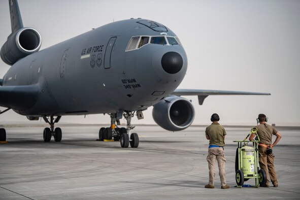 Members of the 380th Expeditionary Aircraft Maintenance Squadron monitor a KC-10 Extender as it prepares for takeoff during an exercise here July 21, 2020.