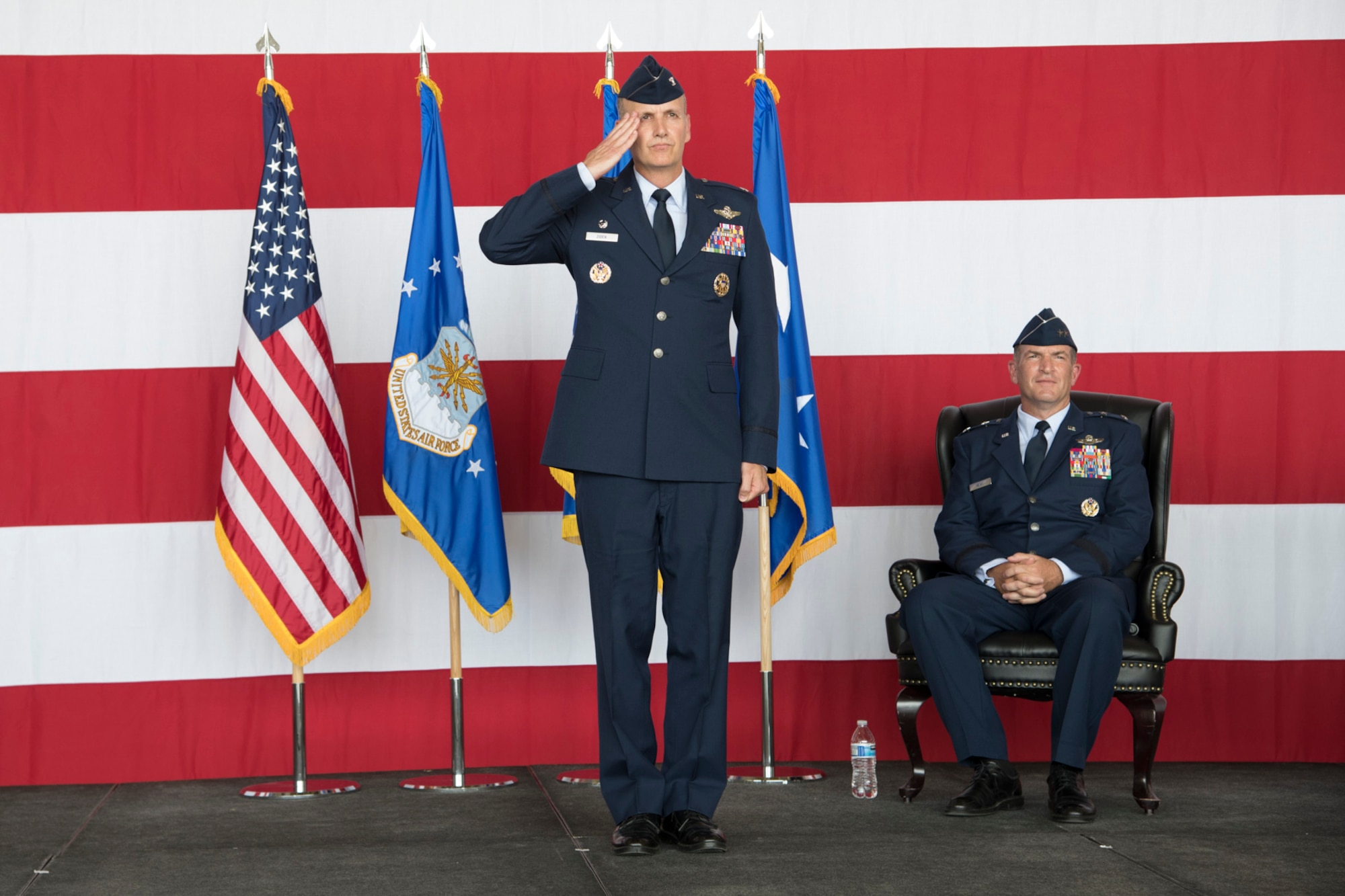 Col. Christopher Zidek, 302nd Airlift Wing commander, receives his first salute as the new commander during the 302 AW change of command ceremony.