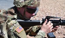 Sgt. Andrew Marks, 2nd Space Battalion, 1st Space Brigade, makes adjustments on his M4 carbine at the qualification range at Fort Carson, Colo., Aug. 1, 2020. (U.S. Army photo by Aaron Rognstad)