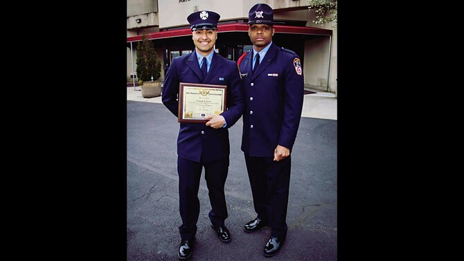 U.S. Air Force Staff Sgt. Fernando Acosta (left), a member of the 439th Contingency Response Flight, works as a firefighter for the Fire Department of the city of New York. Acosta followed his family’s tradition of civil service when he joined the FDNY in 2016. (Courtesy photo)