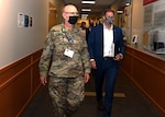 New Hampshire National Guard Lt. Col. Woody Groton, exercise director of Cyber Yankee 2020, leads New Hampshire Gov. Chris Sununu on a tour of the event on July 31, 2020, at the Edward Cross Training Center in Pembroke, N.H. The two-week regional exercise enhanced the Guard's ability to respond to cyberattacks against state government and critical infrastructure.