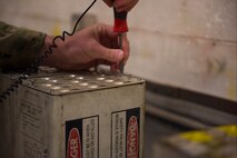 Airman 1st Class Cory Klingener, a conventional maintenance crew member  assigned to the 437th Maintenance Squadron, replaces flares in a flare set, July 20, 2020, at Joint Base Charleston, S.C. The flares are used on aircraft in order to attempt to divert attention when the aircraft is believed to be in danger. This is just one task the munitions flight has to perform, other tasks include flightline support, base support, and NASA and SpaceX support.