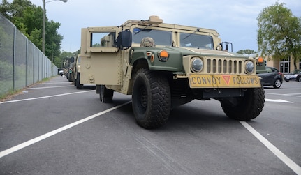 Virginia National Guard Soldiers with the 1st Battalion, 111th Field Artillery Regiment, 116th Infantry Brigade Combat Team, prepare a convoy to travel to the Eastern Shore to respond to Tropical Storm Isaias Aug. 3, 2020, in Norfolk, Virginia. The Virginia National Guard is staging Soldiers and vehicles for state emergency support duty in the Eastern Shore area and in key locations along the I-95 corridor. The Soldiers are ready to assist local and state emergency agencies with Humvees and light/medium tactical trucks for high water transportation and chain saws for removing debris.