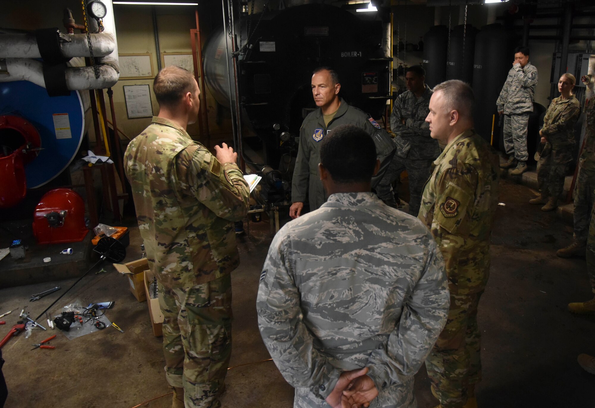 Lt. Col. Nicholas Pulire, 8th Civil Engineer Squadron commander, speaks with Lt. Gen. Scott Pleus, Seventh Air Force commander, about construction and dorm heating, ventilation, air conditioning and refrigeration during his integration with Kunsan Air Base, Republic of Korea, July 29, 2020.