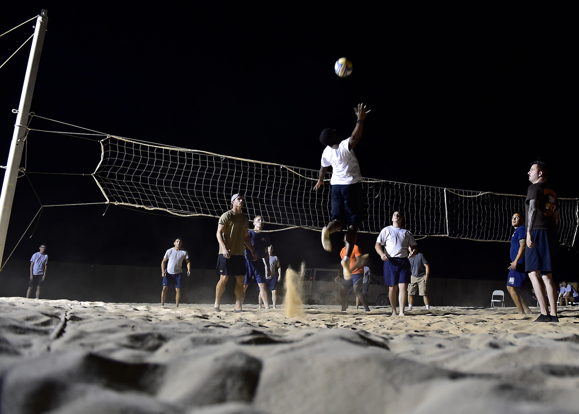 Airmen stationed at Prince Sultan Air Base, Kingdom of Saudi Arabia, compete in a volleyball tournament.