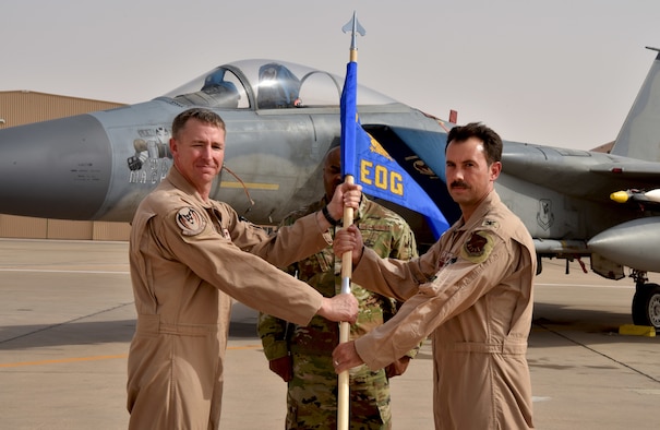 Col. Hurrelbrink, outgoing commander, relinquishes command of the 378th Expeditionary Operations Group to incoming commander, Col. Orgeron during the 378th EOG Change of Command Ceremony at Prince Sultan Air Base, Kingdom of Saudi Arabia.