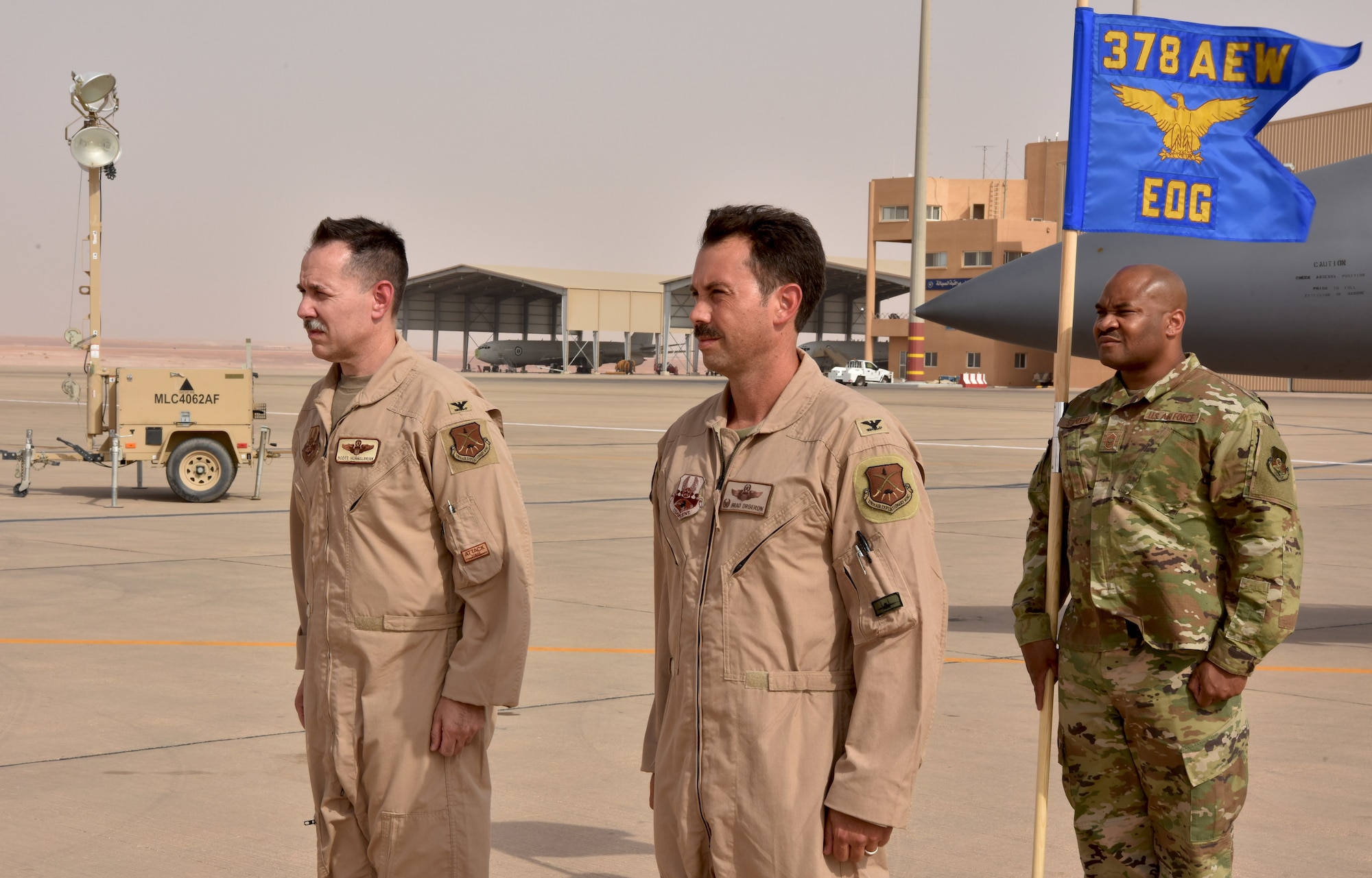Col. Hurrelbrink, outgoing commander, relinquishes command of the 378th Expeditionary Operations Group to incoming commander, Col. Orgeron during the 378th EOG Change of Command Ceremony at Prince Sultan Air Base, Kingdom of Saudi Arabia.
