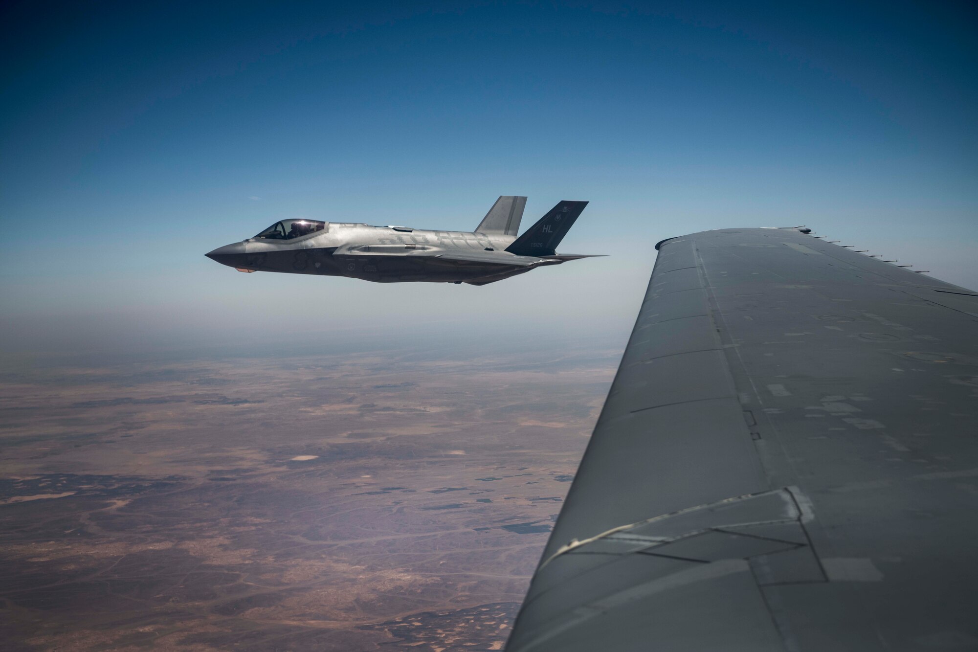 A U.S. Air Force 421st Fighter Squadron F-35A Lightning II flies next to a 908th Expeditionary Refueling Squadron KC-10 Extender after refueling during “Enduring Lightning II” exercise over Israel Aug. 2, 2020. The exercise included both U.S. and Israeli forces whom trained to maintain readiness and to defend the region together. (U.S. Air Force photo by Master Sgt. Patrick OReilly)